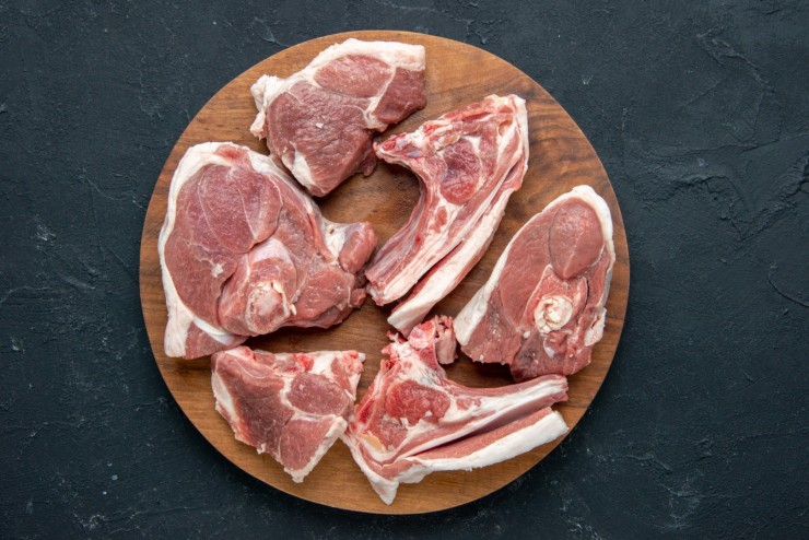 top-view-fresh-meat-slices-raw-meat-round-wooden-desk-dark-food-freshness-animal-cow-meal-food-kitchen (1)