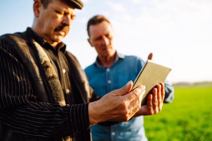 two-farmers-uses-specialized-app-digital-tablet-checking-wheat-agriculture-ecology-concept